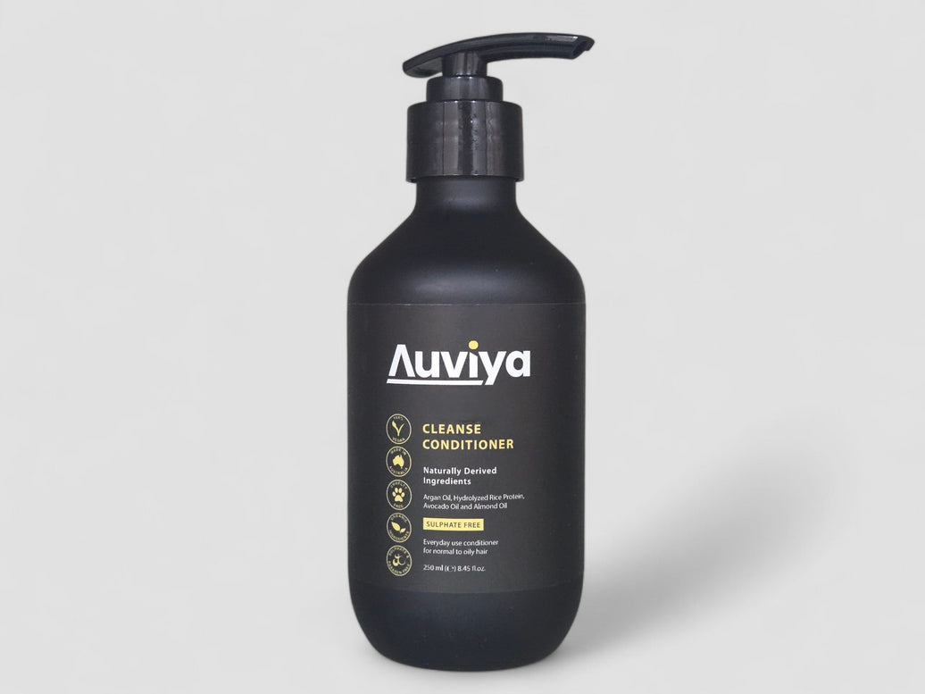 Black bottle of Auviya Cleanse Conditioner on a light gray background